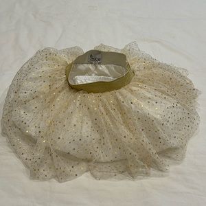 Pippa and Julie baby girl tulle mesh lined Tutu style skirt with gold stars